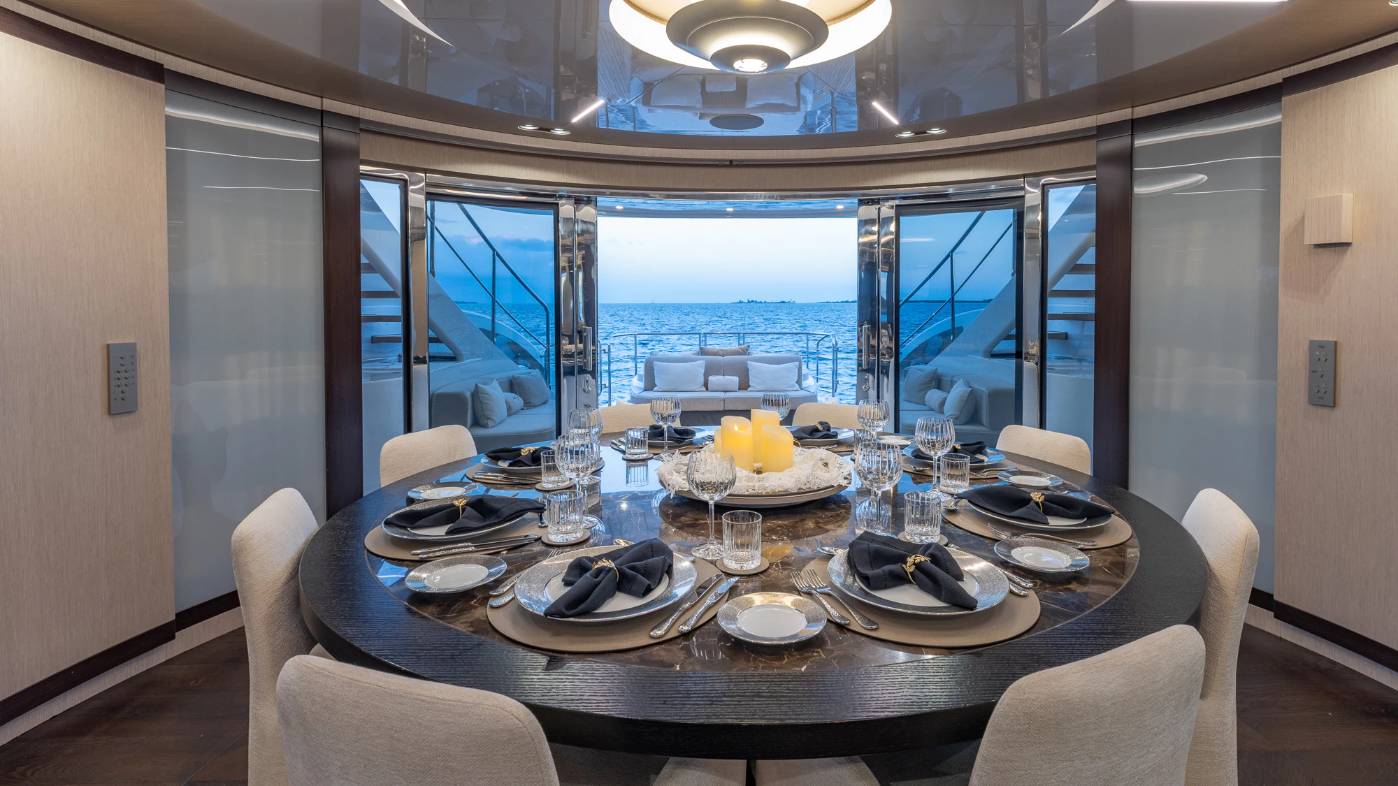 BACK 9 AND A HALF main salon with sliding glass doors open to aft deck