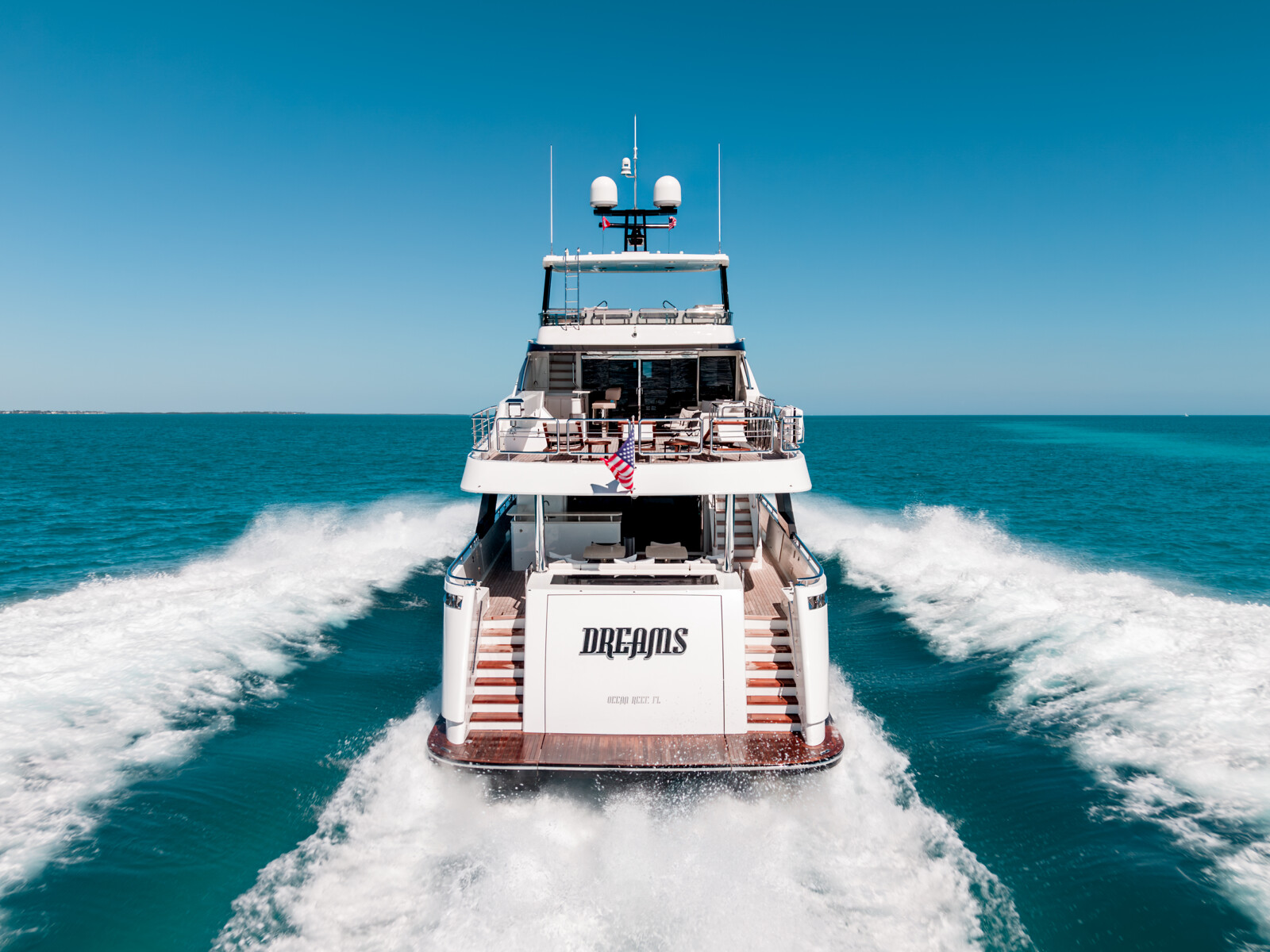 DREAMS Ocean Alexander 120 aft quarter view running offshore